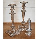 A pair of plated on copper baluster candlesticks (worn), 31 cm to/w an epns baluster sugar caster (