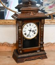 A 'Cottino Torino' oak cased mantel clock with twin train eight day movement