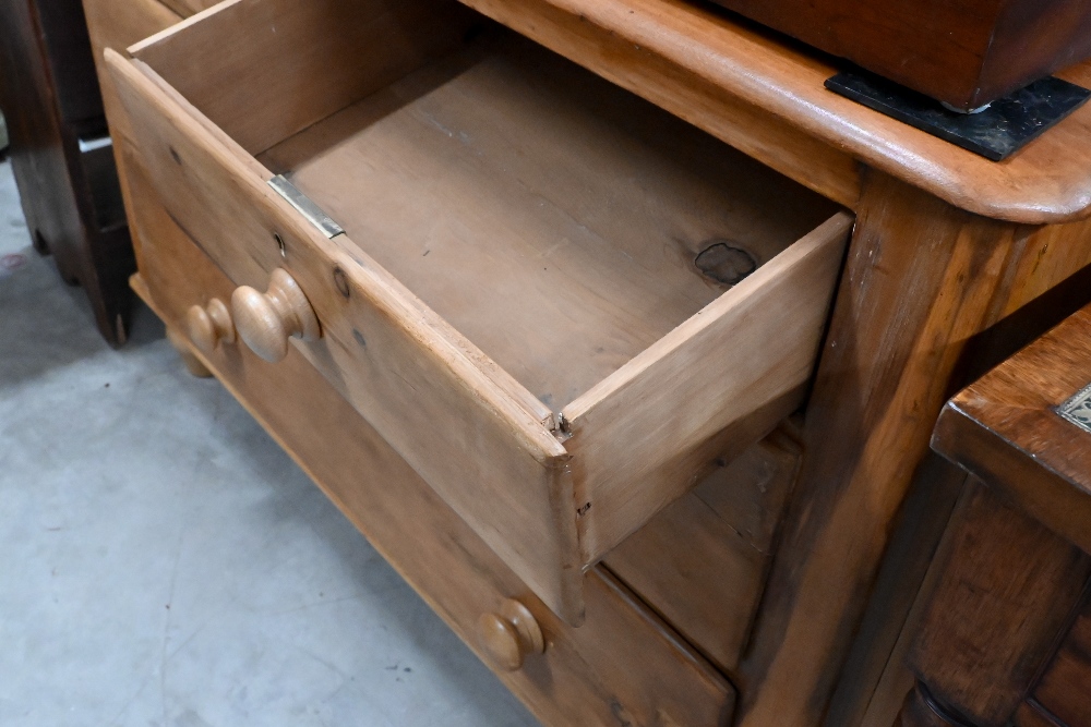 A small stained pine chest of two short over two long drawers with turned handles and supports, - Image 2 of 3