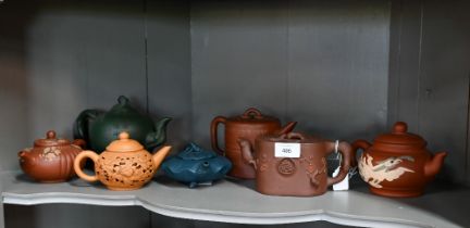 Seven various Chinese Yixing teapots including a 'tree-trunk' example signed 'Rong Ying' and