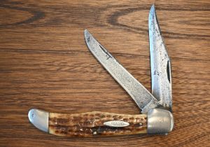 A US Case pocket-knife with two folding 10 cm blades and antler grip