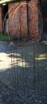 A small weathered steel sweet pea garden frame with separate sphere top (2)