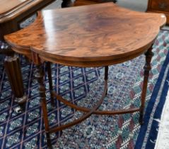 An Edwardian rosewood side table with cartouche-shaped top