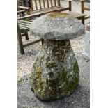 A substantial antique cut stone staddle stone with cap, 82 cm h