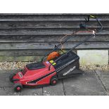 A Mountfield Ransomes 240v electric lawn mower c/with clippings bag