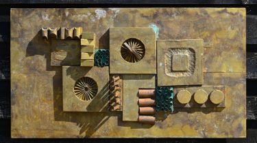 A 1970s abstract design relief panel, copper laid to wood, 50 x 92 cm