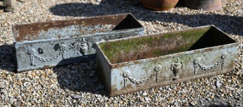 A pair of cast iron Regency style trough planters with vase and garland decoration, 60 cm x 20 cm