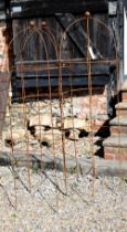 A trio of weathered steel ball head obelisk plant frames, approx. 154 cm h (3)