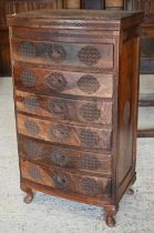 An Anglo-Indian Sheesham wood bowfront tallboy with hinged top with green velvet lined
