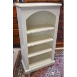 A white painted Laura Ashley(?) open bookcase with three adjustable shelves, 64 x 32 x 116 cm