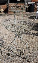 A Victorian style circular two tier wire plant stand, 114 cm h