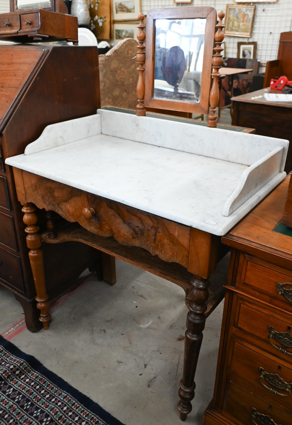An antique French walnut marble top wash stand with single drawer, mirror and turned legs, 80 x 45 x
