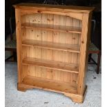 A stained pine open bookcase, 100 x 32 x 120 cm h