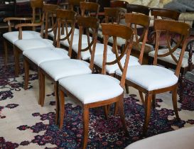 A set of ten traditional Italian fruitwood framed  dining chairs, with cross splats and