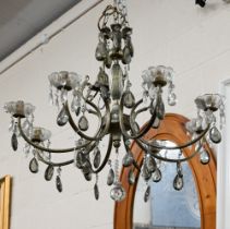 An eight-branch electrolier chandelier with faceted glass drops