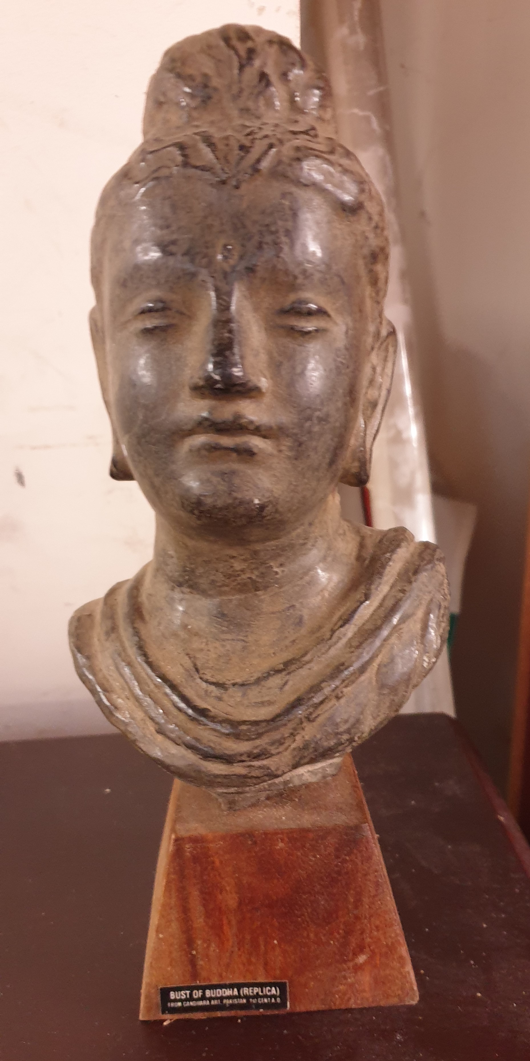 A replica of a Buddha together with other busts, - Image 3 of 12