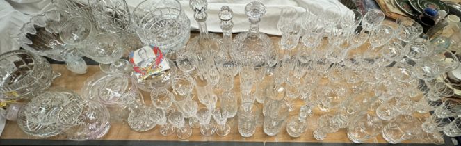 Crystal glass decanters together with drinking glasses, glass bowls,