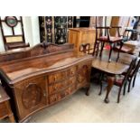 A 20th century mahogany dining suite including a sideboard,