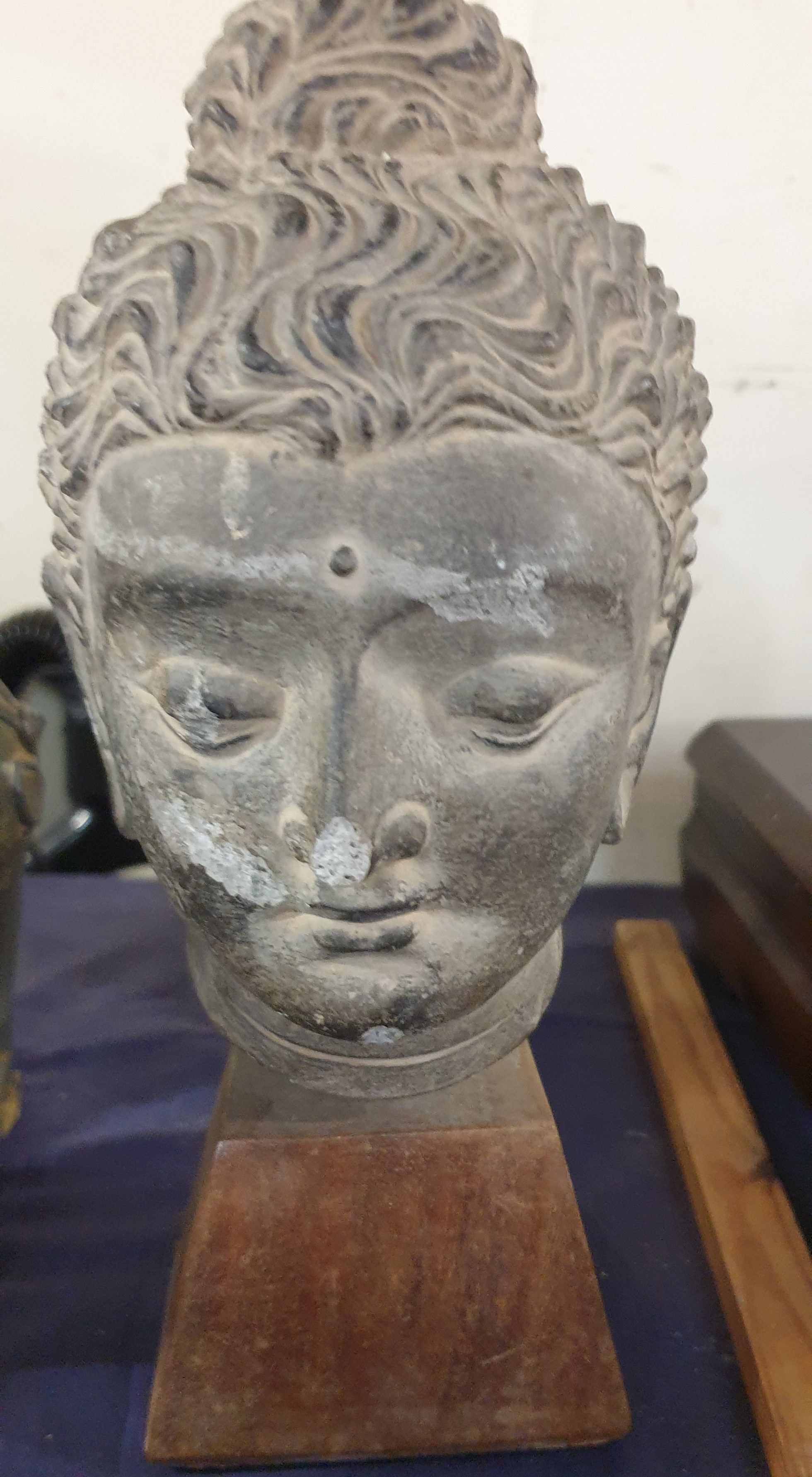 A replica of a Buddha together with other busts, - Image 8 of 12