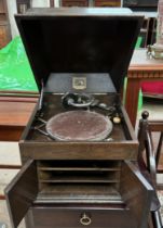 An oak cased HMV table topped gramophone,