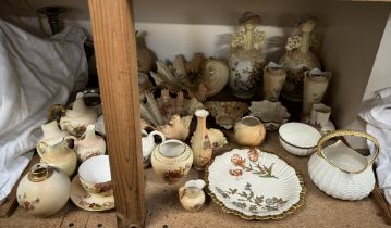 An assortment of Royal Worcester flower decorated blush ivory flat back jugs together with shell