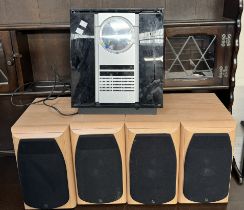 A set of four Infinity speakers together with a Bang and Olufsen music centre (Untested)