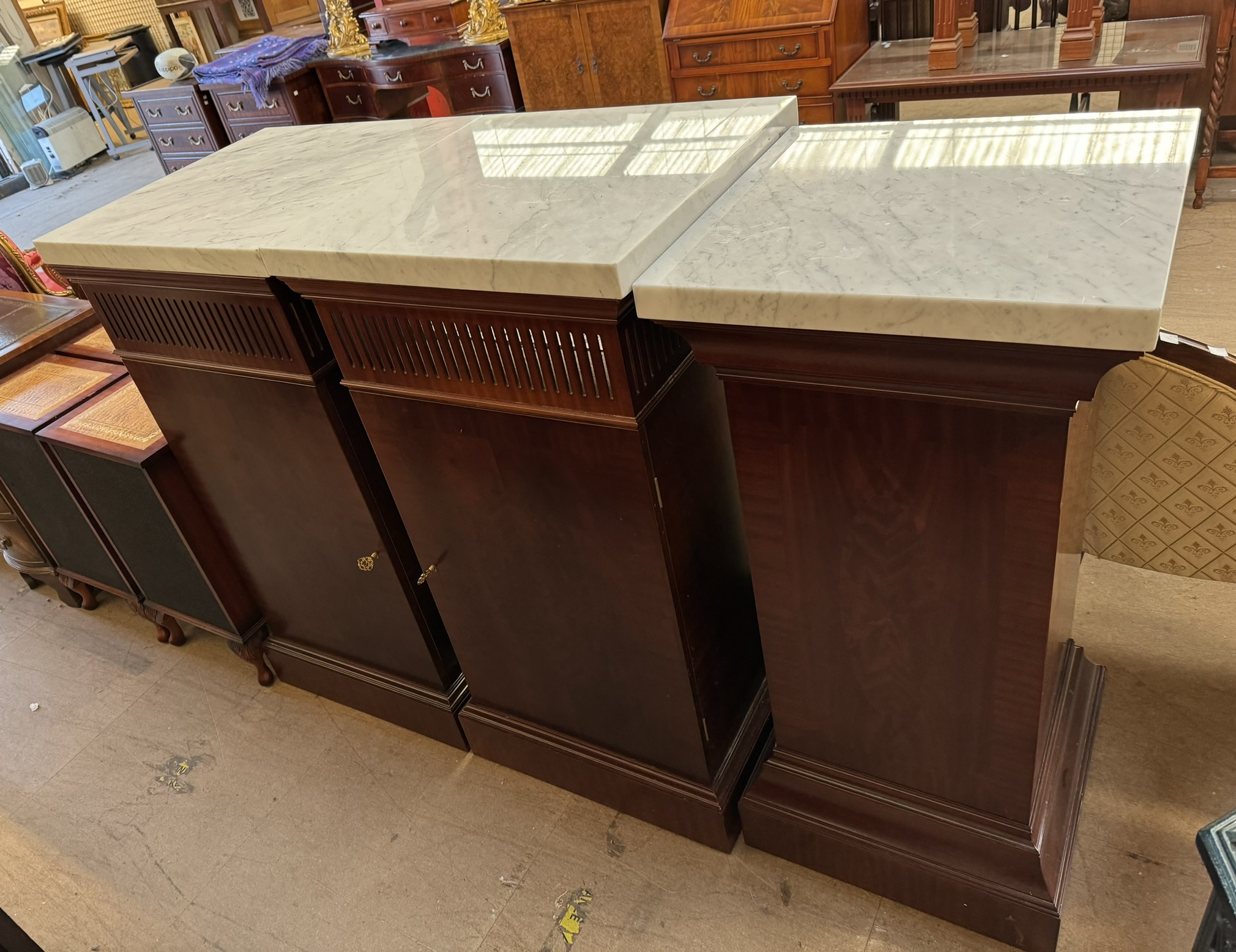 A pair of reproduction mahogany marble topped side cabinets with cupboard doors on a plinth - Image 2 of 2