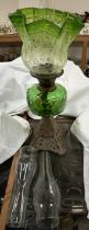 A Victorian green glass oil lamp,