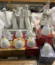 A Lladro swan together with assorted Lladro figures,