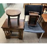 A nest of three oak tables together with a milking stool, dining chair,