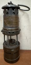 An E Thomas & Williams Ltd steel and brass Midget miner's lamp
