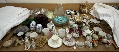 A gilt decorated part tea set together with coffee cans, figures,