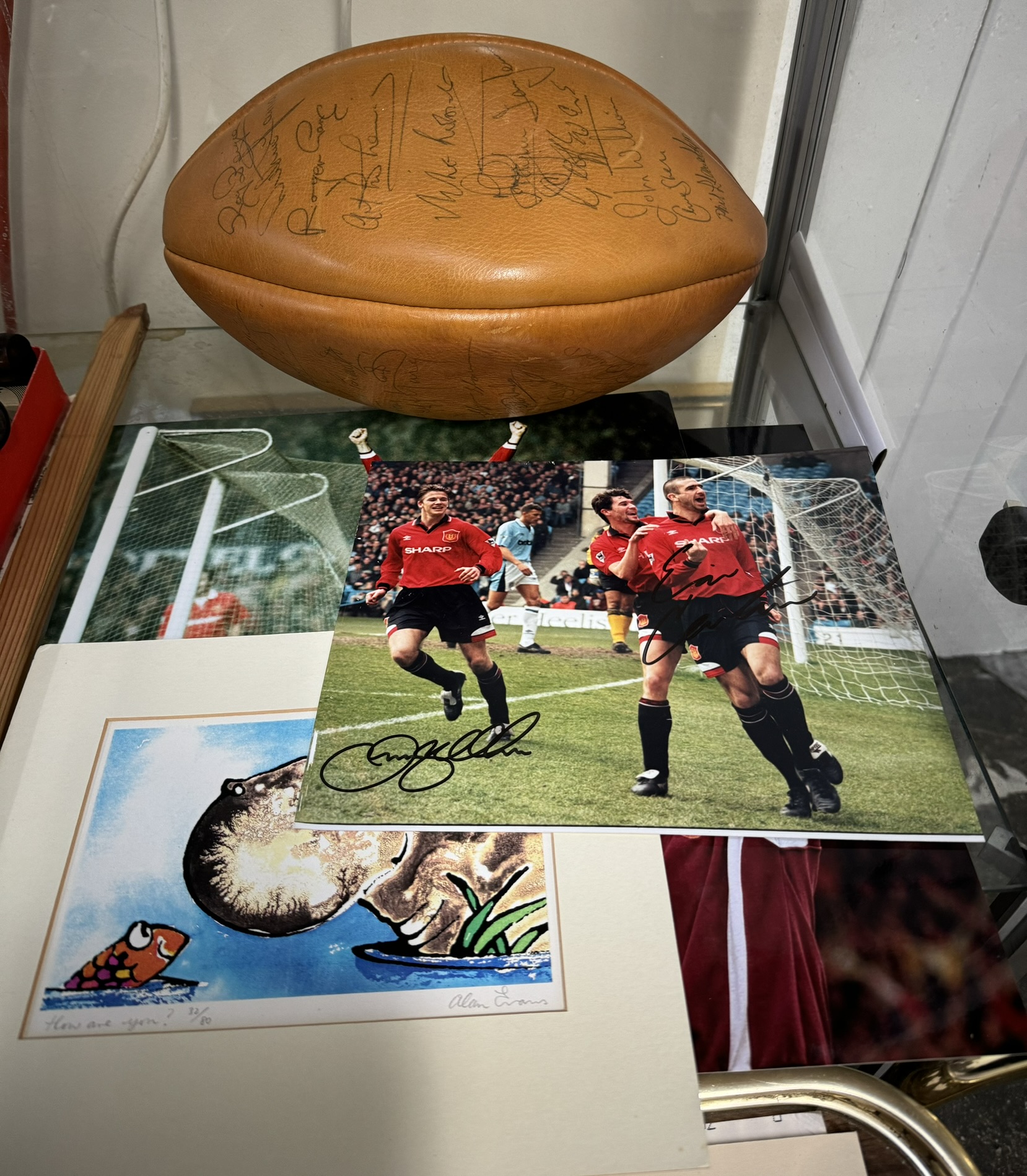 A 1970's mitre rugby ball signed, including Gareth Edwards, Phil Bennett, John Williams,