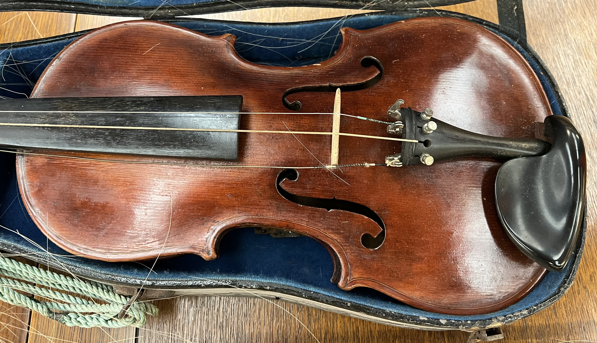 A violin with two piece back and ebonised stringing, bears a label for Antonious Stradivarius, 59. - Image 2 of 7