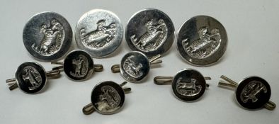 A collection of Firmin white metal buttons