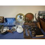 A brass circular mirror together with a brass tray, carved antelope head, woodworking tools,