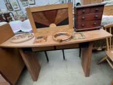 A 20th century hall table with swivel drawers together with a mahogany miniature chest of drawers,