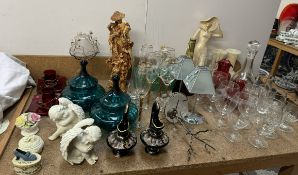 Resin figures together with drinking glasses, decanter,