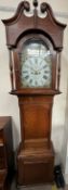 A 19th century oak longcase clock the hood with a broken swan neck pediment and turned columns,
