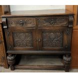 A 20th century oak side cabinet,