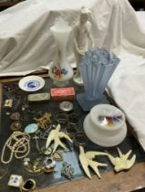 A collection of costume jewellery including faux pearls, brooches etc together with glass vases,