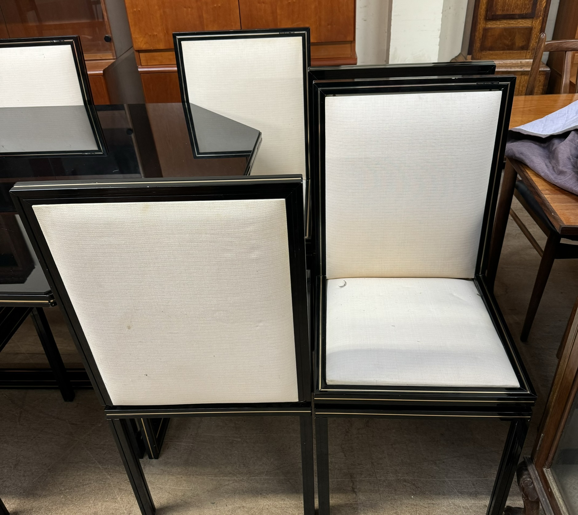 A Pierre Vandel high gloss black dining table together with eight chairs and a matching sideboard - Image 3 of 3