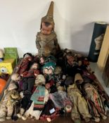 A collection of souvenir dolls etc