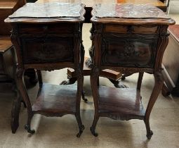 A pair of French marble topped rosewood bedside cabinets with a serpentine top,