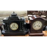 A black slate mantle clock of architectural form with an insight movement together with a mahogany