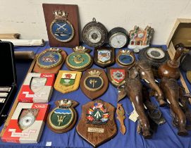 Various military shields together with barometers, Staffordshire cottage, carved elephant heads,