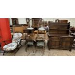 An Ercol dining table and six chairs,