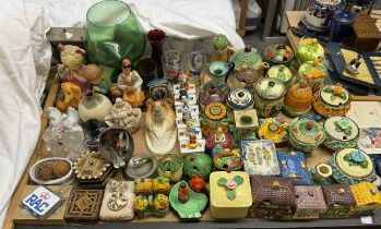 A collection of Japanese pottery preserve pots and covers together with Japanese pottery cruets,