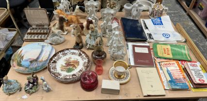 A Davenport cabinet cup and saucer together with parian figures and spill vases, cranberry glass,