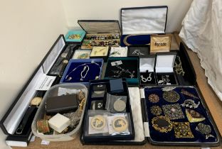 Assorted costume jewellery including watches, brooches, coins,